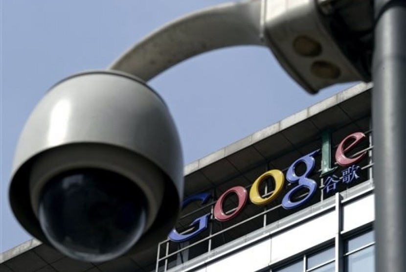 In this March 23, 2010 file photo, a surveillance camera is seen in front of the Google China headquarters in Beijing, China. 