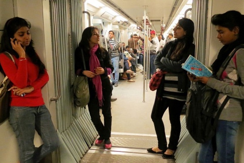 Indian women travel inside a Women Only metro train compartment in New Delhi, India, Saturday, Feb. 2, 