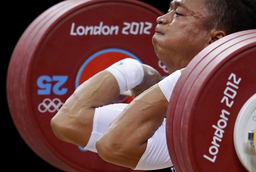 Indonesia's Triyatno Triyatno competes on the men's 69 Kg Group A weightlifting competition at the ExCel venue at the London 2012 Olympic Games July 31, 2012. Indonesian Chef de Mission for Olympics 2012, Erick Thohir, promises that weightlifting will have