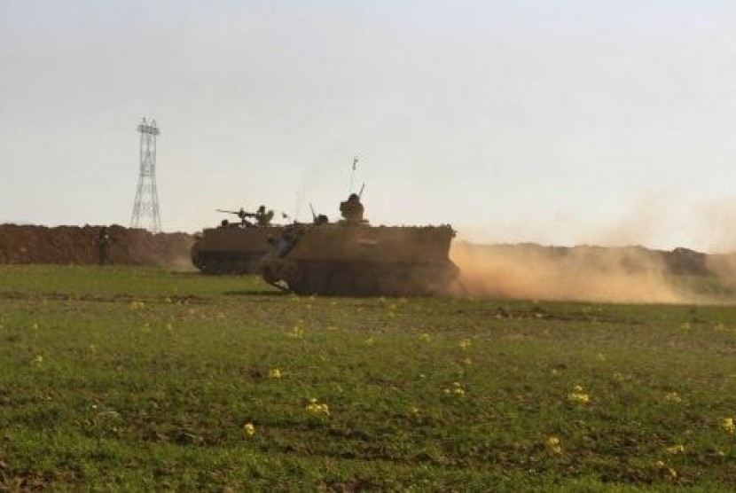 Iraqi soldiers take part in an intensive security deployment in Sulaiman Pek, 160 km (99 miles) north of Baghdad, February 21, 2014.