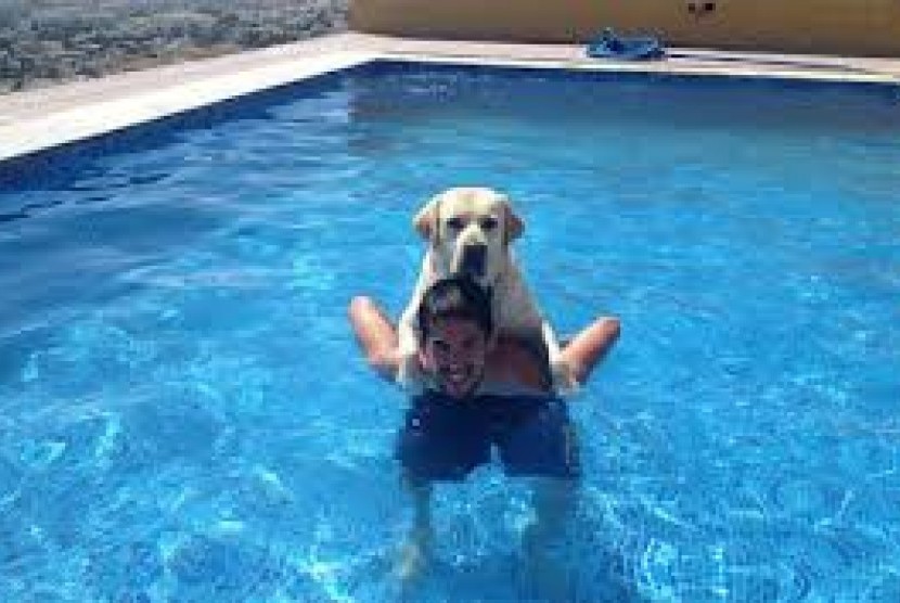 Isco dan anjing kesayangannya yang bernama Messi