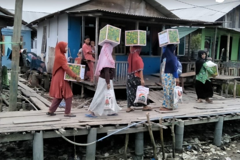 IZI salurkan Paket Ramadhan ke Kampung Nelayan, Sumatra Utara.