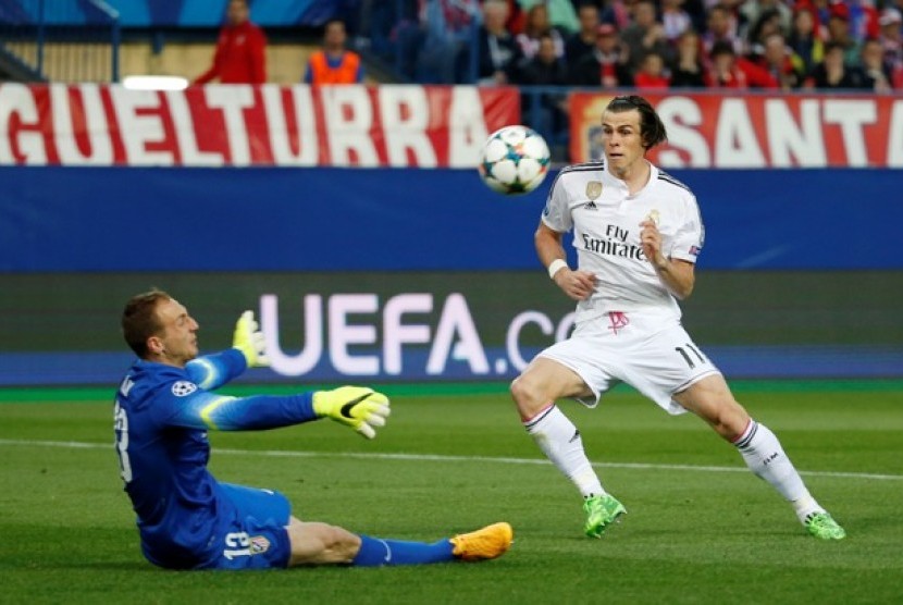 Jan Oblak saat memblok tendangan Gareth Bale