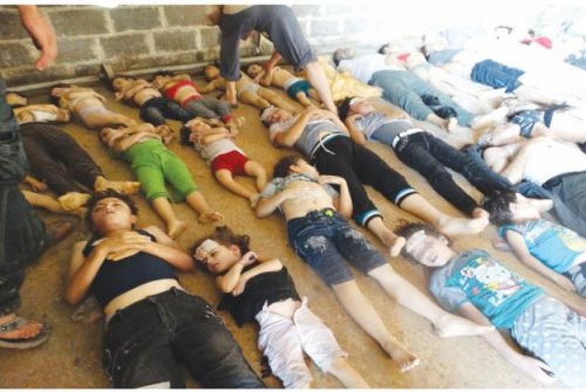 Jasad korban serangan senjata kimia di Ghouta, Suriah, Rabu (21/8). 