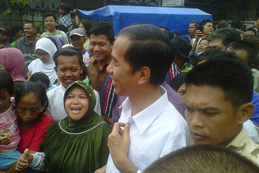 Jokowi dan warga pengungsi Kebon Baru, Tebet, Rabu (22/1)