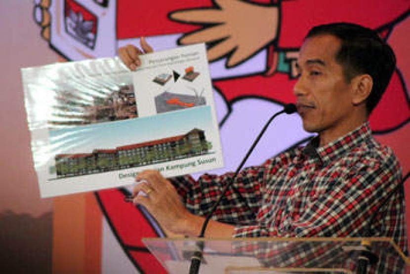 Jokowi memperlihatkan gambar Kampung Deret