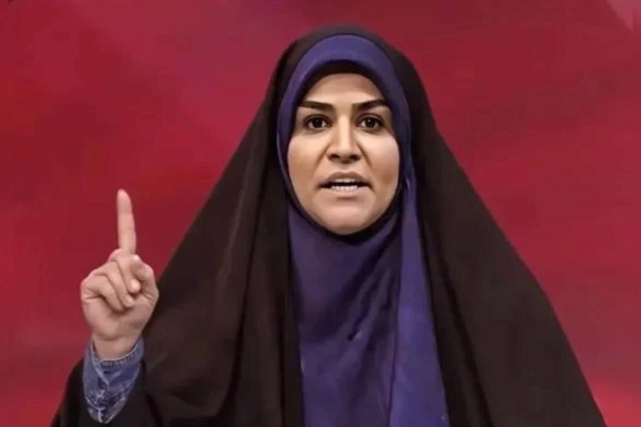 Jurnalis perempuan Iran, Sahar Emami. Emami melanjutkan siarannya meskipun rudal Israel menyerang studio IRIB.