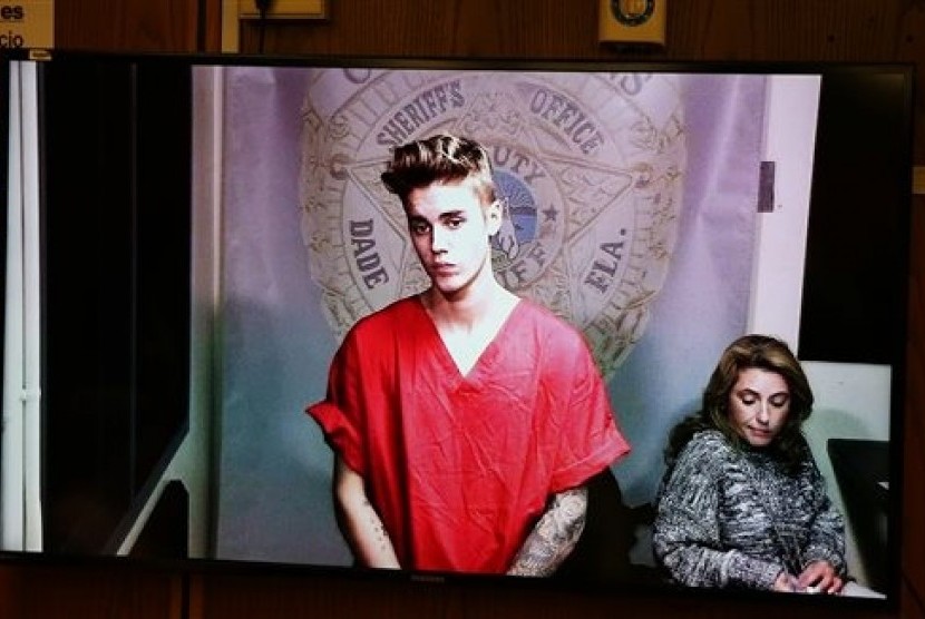 Justin Bieber appears in court via video feed, Thursday, Jan. 23, 2014, in Miami. 