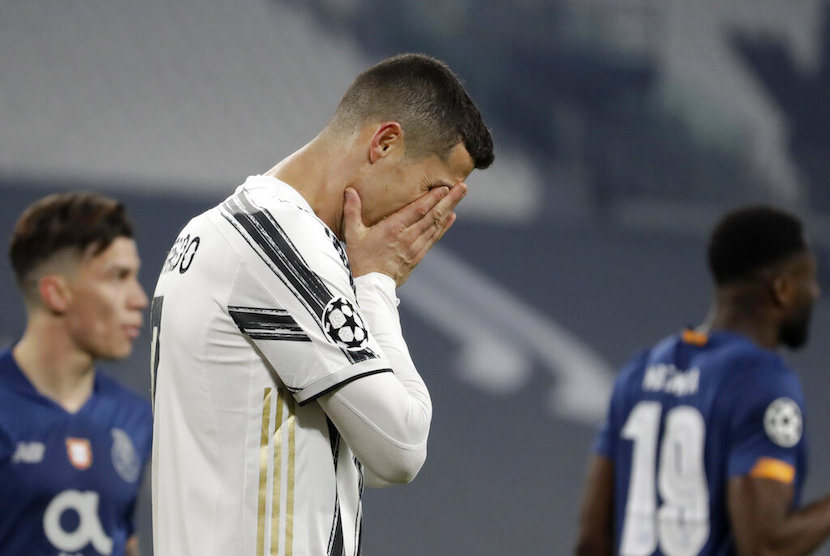 Juventus Cristiano Ronaldo reacts during the Champions League, round of 16, second leg, soccer match between Juventus and Porto in Turin, Italy, Tuesday, March 9, 2021.