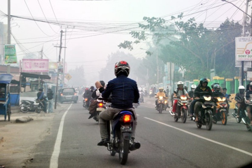 Kabut asap melanda Palembang