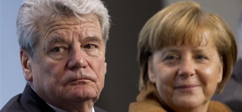Kanselir Jerman, Angela Merkel  dan mantan aktivis hak asasi Jerman Timur, Joachim Gauck yang diajukan Merkel menjadi Presiden Jerman