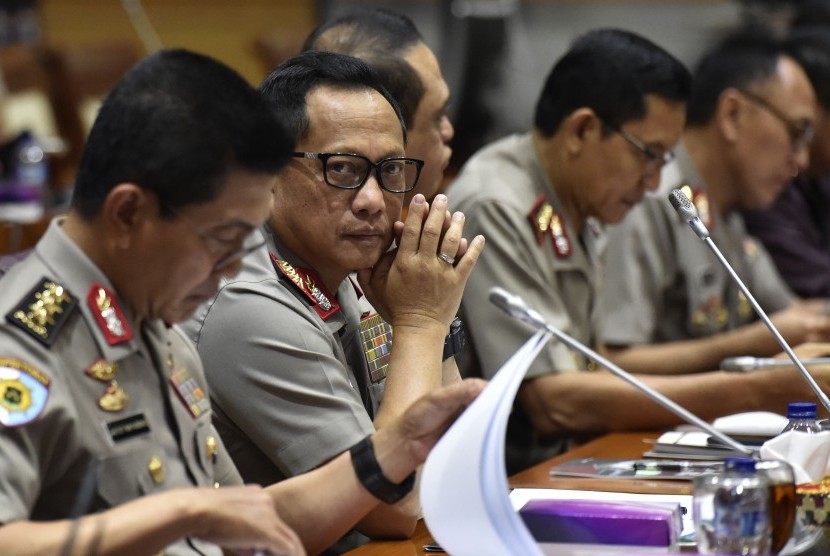 National Police chief Tito Karnavian (second left) and his deputy Syafruddin (center) attend working meeting with Commission III House of Representatives at Parliament complex, Jakarta, on Wednesday (March 14).