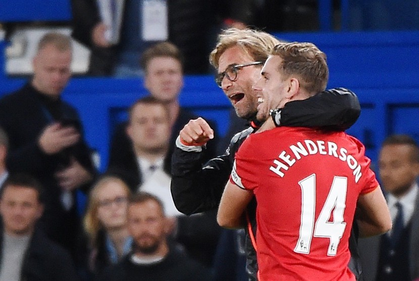 Kapten Liverpool, Jordan Henderson dan pelatih, Juergen Klopp.