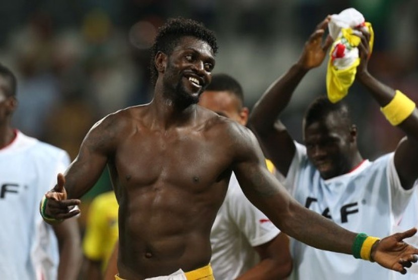 Kapten Togo Emmanuel Adebayor merayakan kelolosan timnya ke perempat final Piala Afrika setelah menahan imbang Tunisia 1-1 di Nelspruit, Kamis (31/1) dini hari.