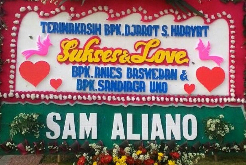 Karangan bunga untuk pasangan Anies Baswedan-Sandiaga Uno.