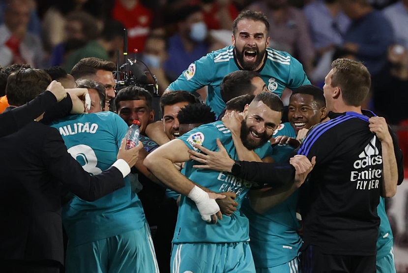 Karim Benzema jadi penentu kemenangan Real Madrid atas tuan rumah Sevilla dalam lanjutan La Liga di Estadio Ramon Sanchez Pizjuan, Senin (18/4/2022)