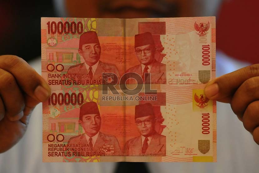 The new Indonesia's bank notes (above) and the old one (illustration)