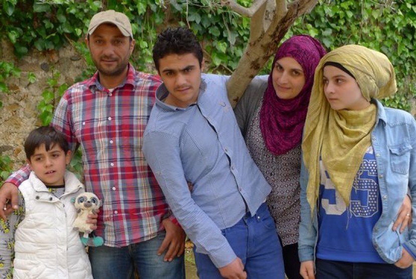 Keluarga al-Elfi asal Suriah yang mengungsi di Prancis. Dari kiri, Houman (delapan tahun), Malek, Hisham (15), Khaldieh dan Fata (12).