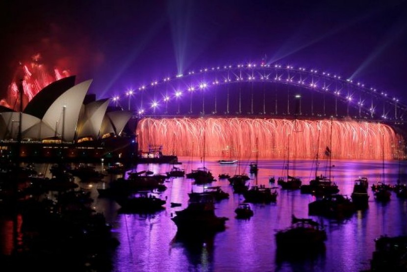 Kemegahan pesta kembang api akhir tahun di Sydney yang gabungkan cahaya dan musik.  