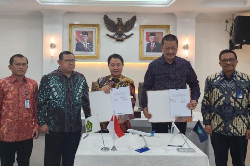Kementerian Agama dan Garuda Indonesia menandatangani kerja sama angkutan jamaah haji 1445 Hijriah/2024 Masehi. 