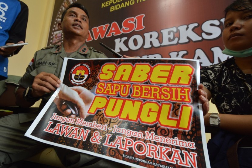 Tim Sapu Bersih (Saber) Pungutan Liar (Pungli) (Ilustrasi) 