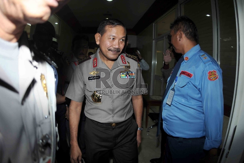 Kepala Kepolisian Republik Indonesia (Kapolri) Badrodin Haiti n usai mengikuti Rapat Dengar Pendapat dengan Panitia Kerja (panja) Perppu KPK di Komisi III DPR RI, Kompleks Parlemen Senayan, Jakarta, Rabu (22/4).  (Republika/Agung Supriyanto)