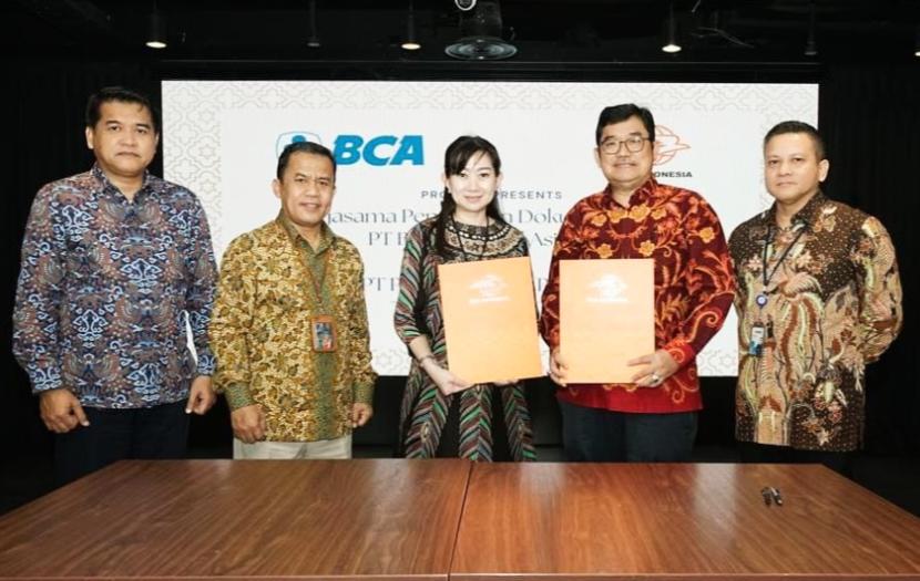 Kerja sama bisnis pengiriman dokumen antara PT Pos Indonesia dengan Bank BCA.