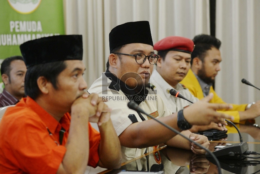 Ketua Ikatan Pemuda Muhammadiyah Dahnil Anzar Simanjuntak saat mmberikan keterangan pers di Gedung Pusat Muhammadiyah, Jakarta, Rabu (22/7).