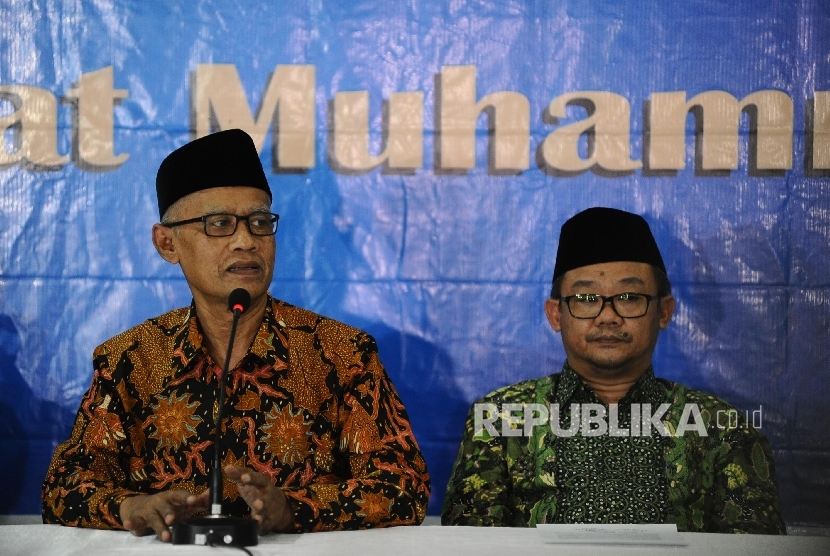 Ketua Umum Muhammadiyah Haedar Nashir (kiri), Sekretaris Umum Abdul Mu'ti (kanan).