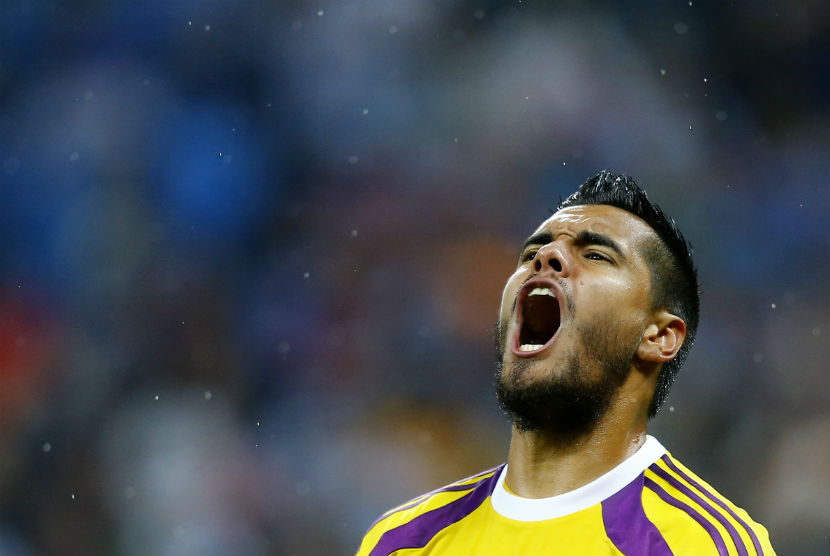 Kiper Argentina, Sergio Romero, berteriak usai menggagalkan tendangan penalti pemain Belanda, Ron Vlaar, dalam adu penalti di babak semifinal Piala Dunia 2014 di Arena Corinthians, Sao Paulo, Rabu (9/7). 