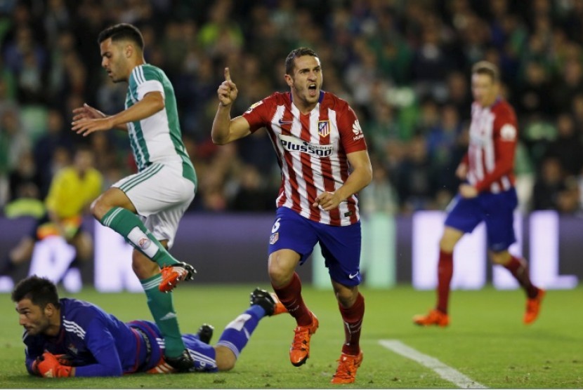 Koke merayakan golnya ke gawang Real Betis.