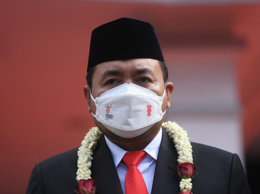 Komisioner Komisi Pemilihan Umum (KPU) periode 2022-2027 Mochammad Afifuddin tiba di Gedung KPU, Jakarta, Selasa (12/4/2022). Presiden Joko Widodo resmi melantik tujuh komisioner KPU periode 2022-2027.