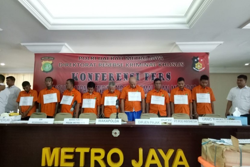 Konferensi pers pemalsuan materai di Mapolda Metro Jaya, Rabu (20/3).