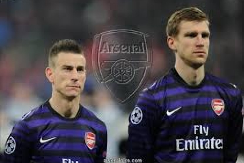 Laurent Koscielny dan Per Mertesacker