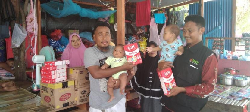   Laznas BMH menyalurkan bantuan susu bayi dan sembako kepada korban kebakaran di Youtefa, Jayapura, Papua.