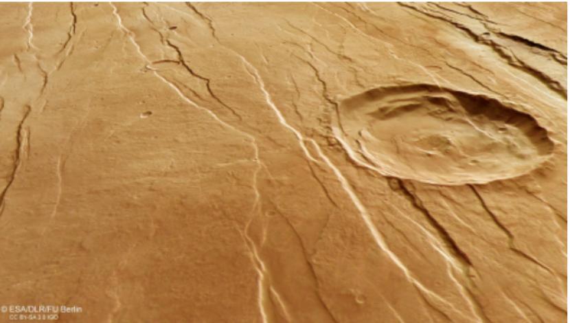 Lekukan ini adalah bagian dari sistem patahan raksasa di Mars yang dikenal sebagai Tantalus Fossae.