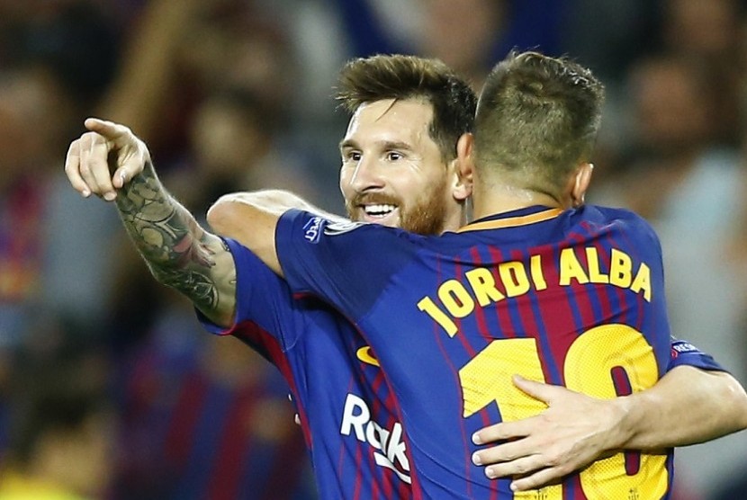 Lionel Messi (kanan) merayakan golnya ke gawang Juventus bersama Jordi Alba.
