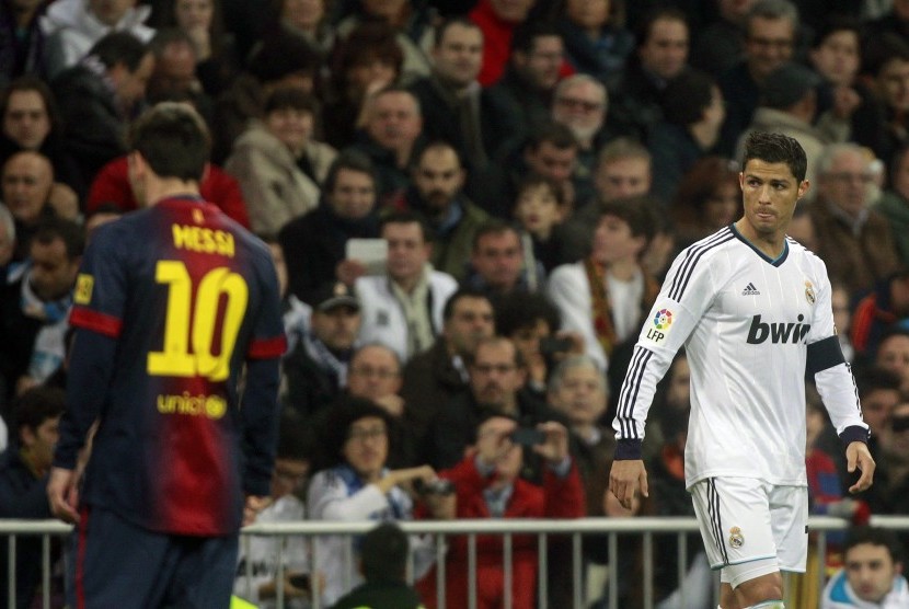 Lionel Messi (kiri) dan Cristiano Ronaldo (kanan)