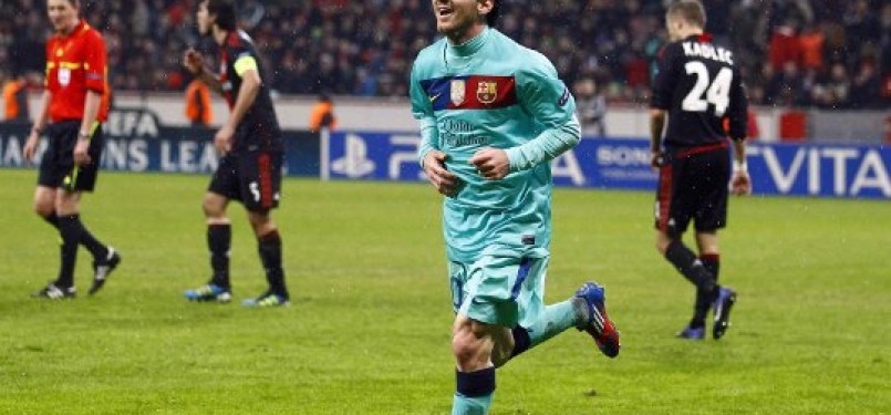 Lionel Messi setelah mencetak gol ketiga babak 16 besar Liga Champion melawan Bayer Leverkusen