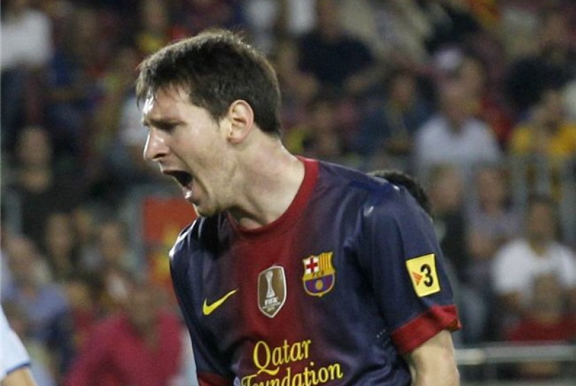 Lionel Messi, striker Barcelona, meluapkan kekesalannya usai gagal mencetak gol saat menghadapi Granda di laga Liga Spanyol di Stadion Camp Nou, Barcelona, Sabtu (22/9). 
