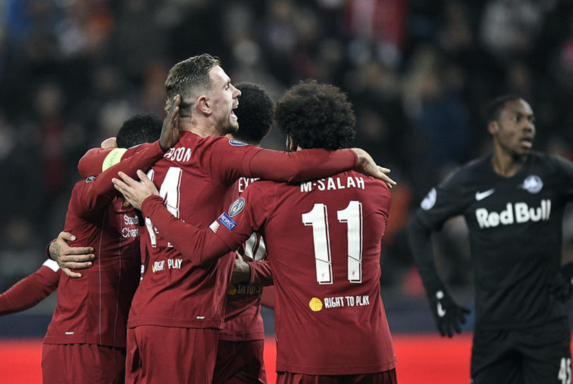Liverpool lolos ke Babak 16 Besar ilga Champions usai mengalahkan Salzburg 2-0 di Stadion Red Bull, Rabu (11/12) dini hari WIB. 