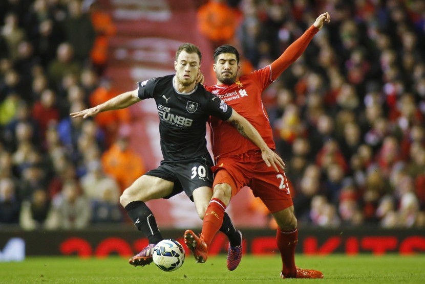  Liverpool's Emre Can in action with Burnley's Ashley Barnes 