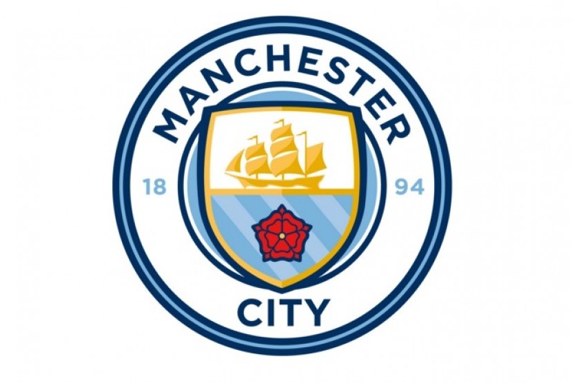 Logo Manchester City. City tidak akan mengikuti langkah klub-klub lain yang memangkas gaji pemain dan staf di tengah pandemi corona.