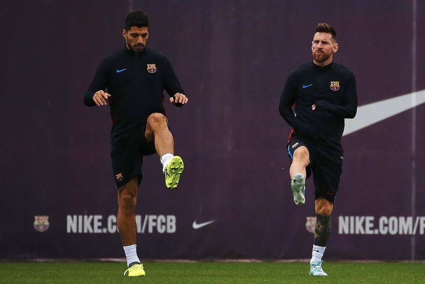 Luis Suarez dan Lionel Messi.