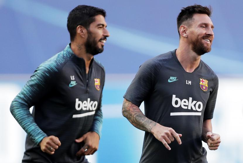 Luis Suarez (Kiri) dan Lionel Messi saat masih sama-sama membela Barcelona. Kedua pemain memimpikan pensiun dari sepak bola bersama-sama.