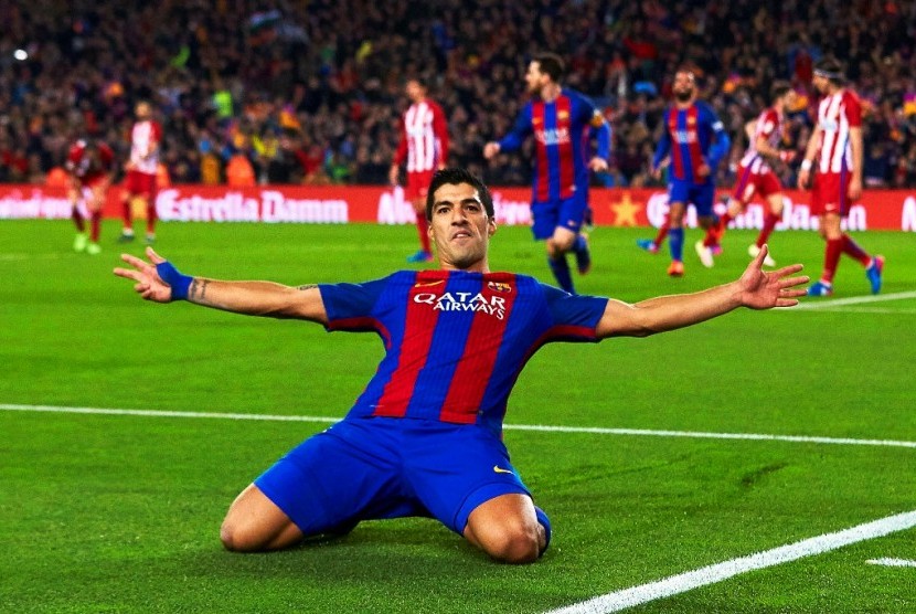 Luis Suarez seusai menjebol gawang Atletico Madrid.