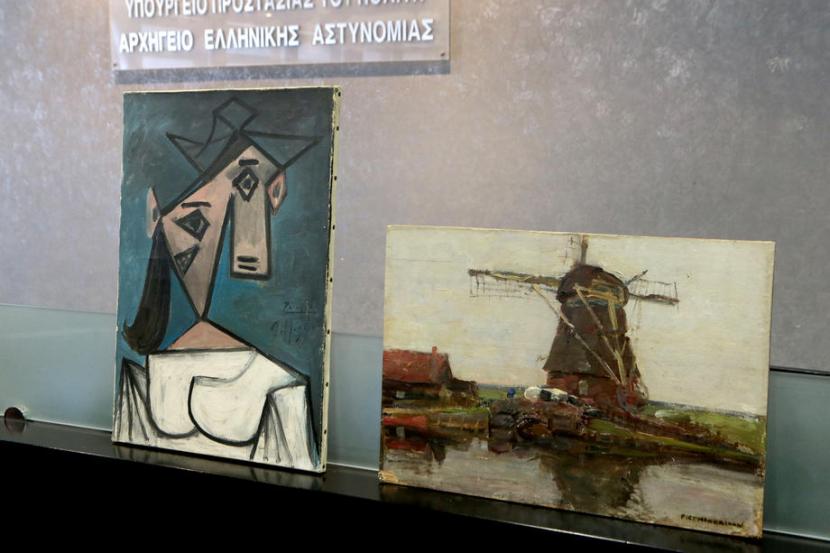 Apakah Melukis Haram? Ini Jawaban Quraish Shihab. Lukisan Head of a Woman karya Picasso (kiri) dan Stemmer Windmill karya Piet Mondrian ditemukan di pinggiran Yunani setelah hilang sembilan tahun lalu dari Galeri Nasional Athena.
