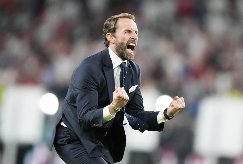 Manajer Inggris Gareth Southgate merayakan setelah semifinal UEFA EURO 2020 antara Inggris dan Denmark di London, Inggris, 07 Juli 2021.