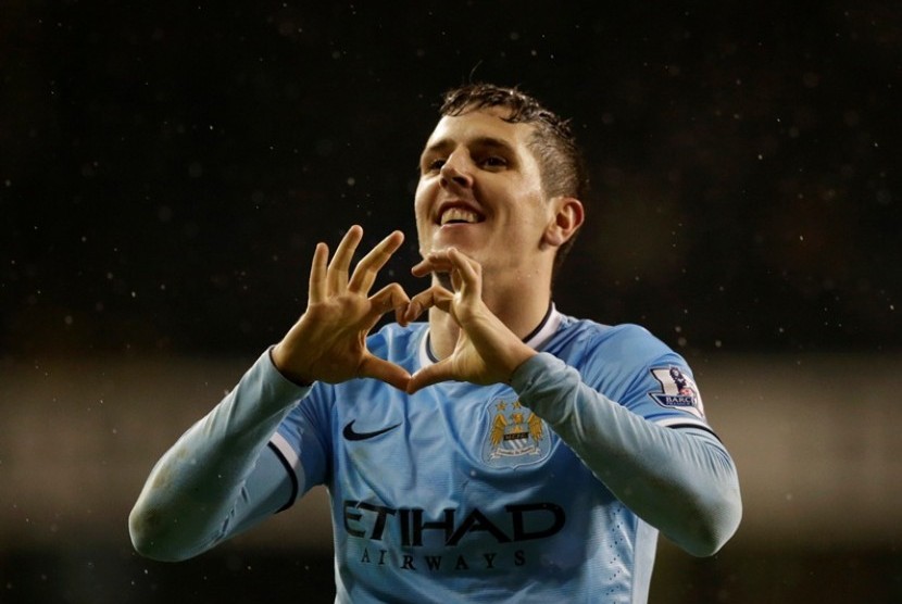 Manchester City's Stevan Jovetic celebrates scoring his side's fourth goal during the English Premier League soccer match between Tottenham Hotspur and Manchester City at White Hart Lane stadium in London, Wednesday, Jan. 29, 2014. 