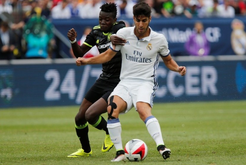 Marco Asensio (kanan)